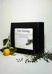 Schwarze Verpackung von einer Gin Tasting Box mit Gin und Tonic Water